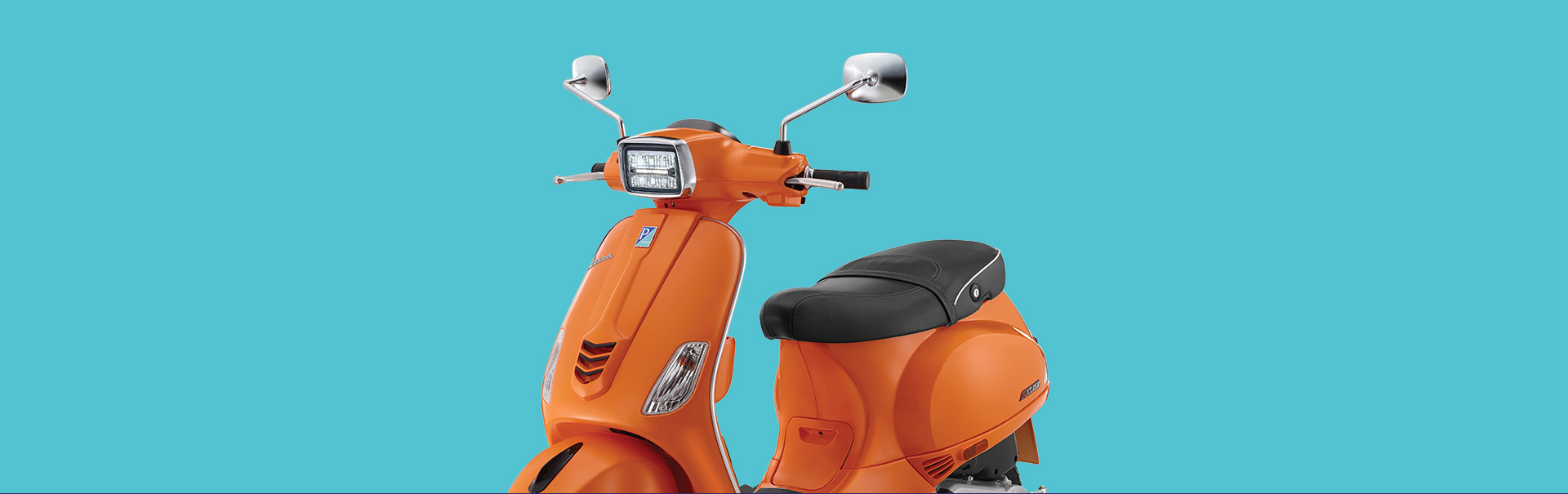 orange vespa scooter